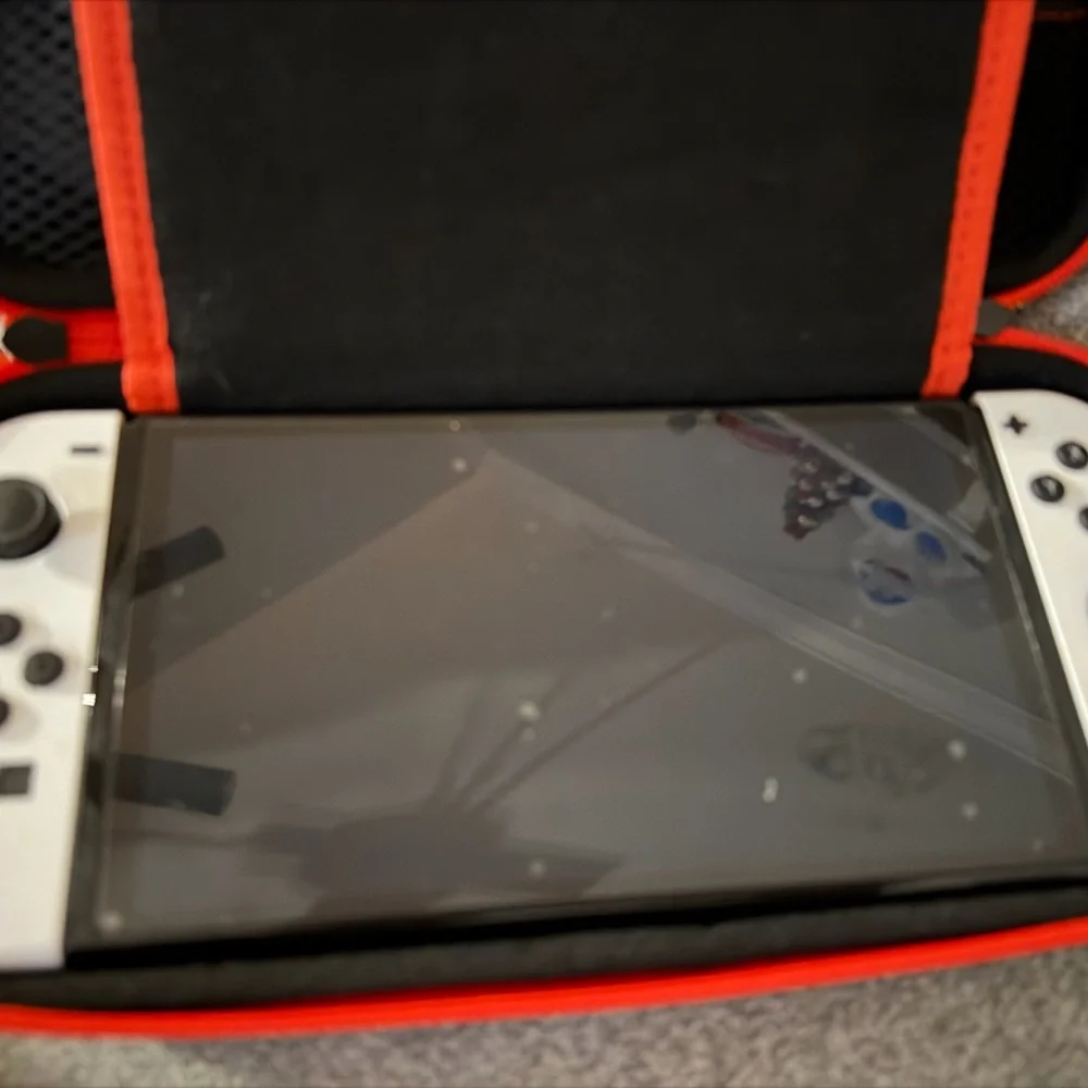 Nintendo Switch OLED Console & Mario + Rabbits Game (Kingdom Battle)
